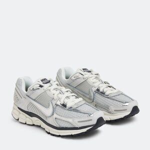 Nike style with these Zoom Vomero 5 sneakers.